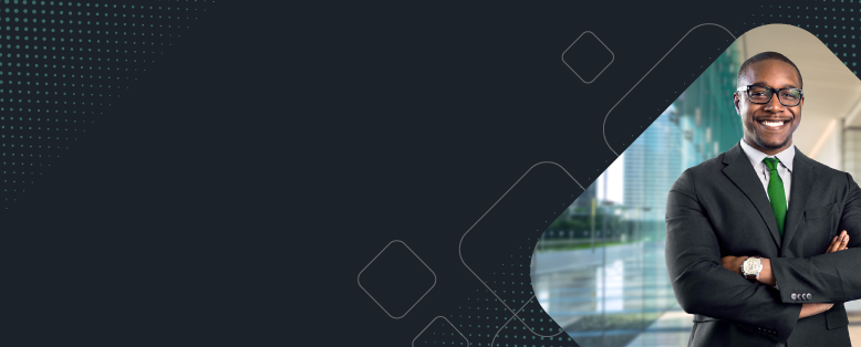 Businessman in glasses smiles about Sage Intacct’s not-for-profit accounting software for charities and non-profits